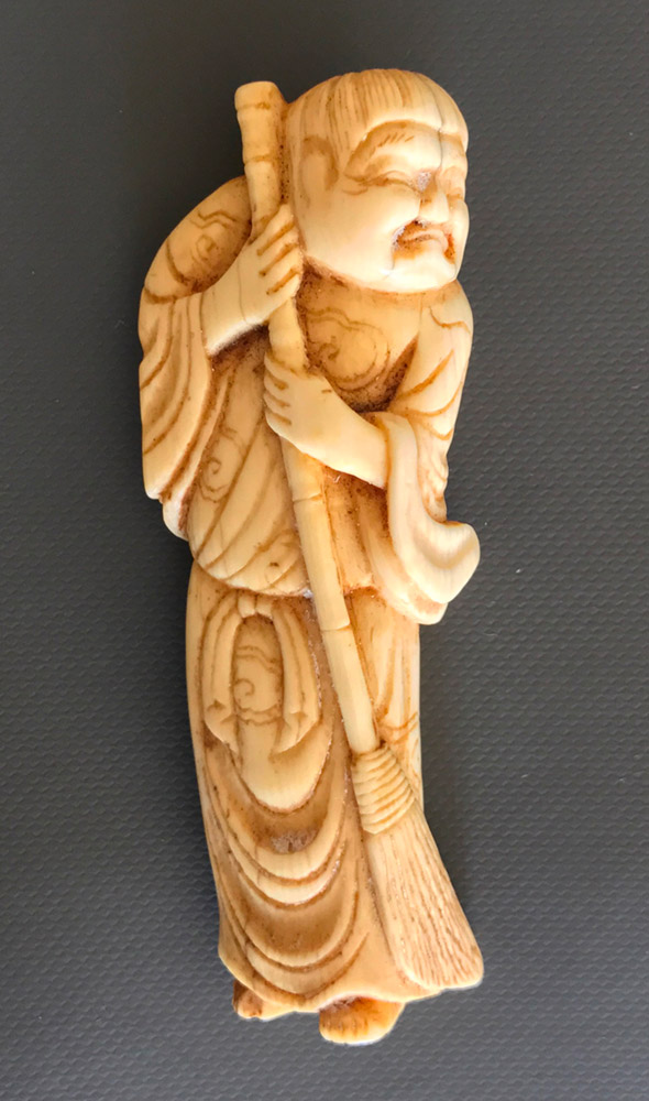  Ivory netsuke of Kanzan holding his broom