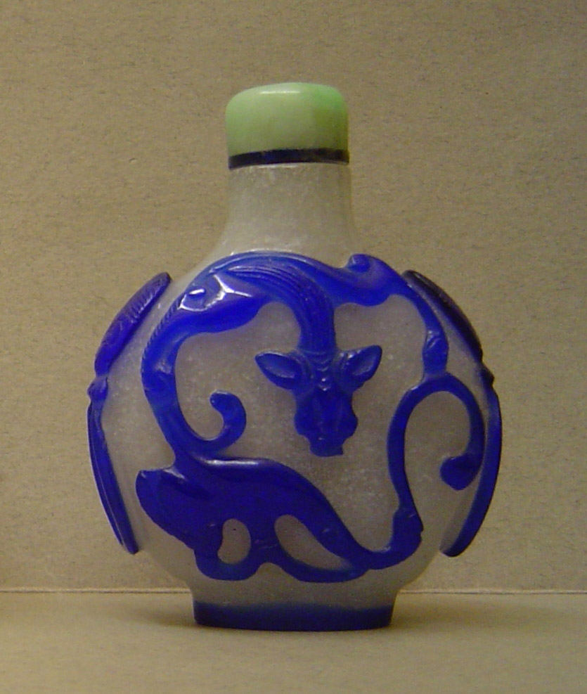 Overlay glass snuff bottle with blue chilong